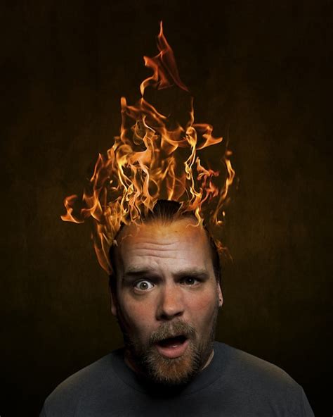 man with head on fire